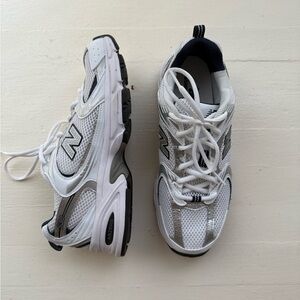 New Balance White and Black Sneakers